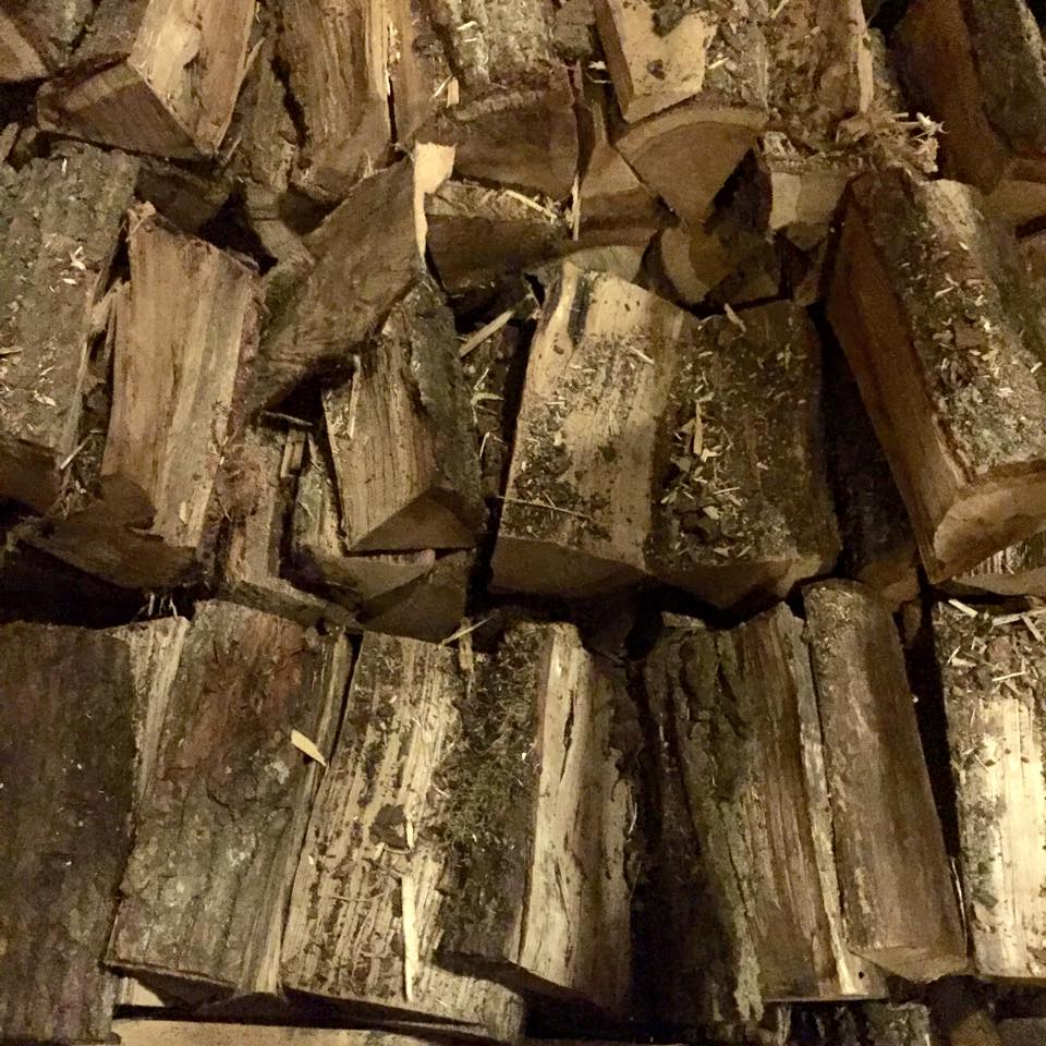   Piles of wood stacked in a Copenhagen bar. Something about firewood indoors makes me very happy. I don't have a fireplace, but I do have a wood smoke candle that makes me house feel and smell super cozy.  